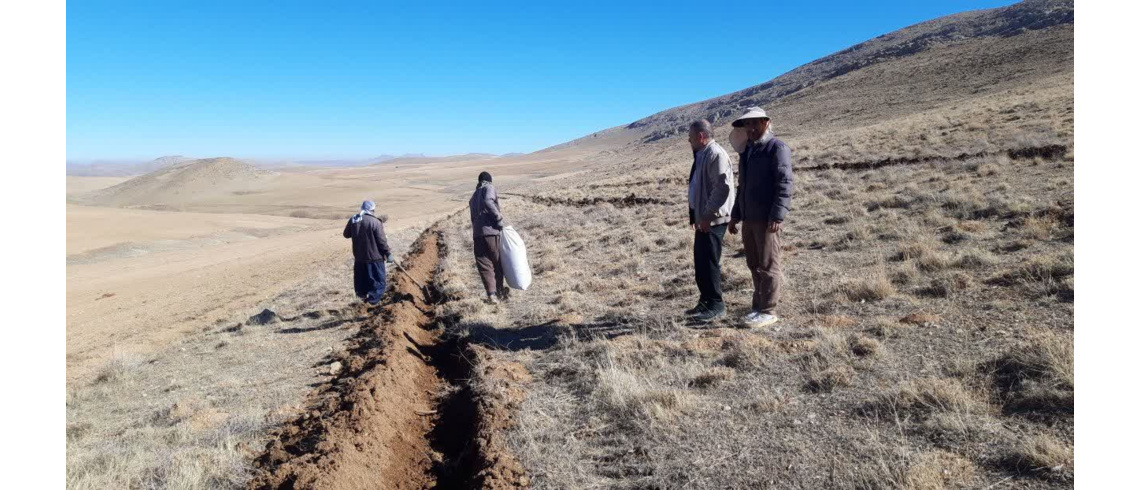 اجرای پروژه بذرکاری در اراضی ملی روستای قراکند اسدآباد